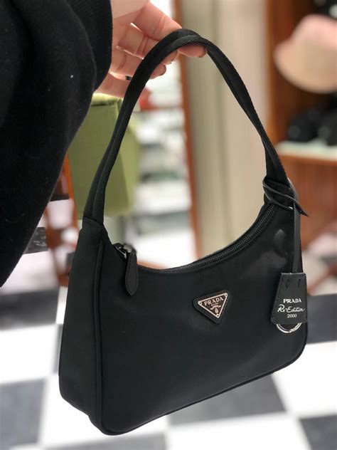 mini me prada|prada nylon mini bag price.